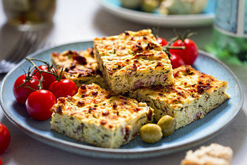 Frittata with bacon, courgette, feta