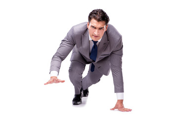 Businessman on start ready for running isolated on white