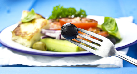 Greek salad with grilled feta cheese
