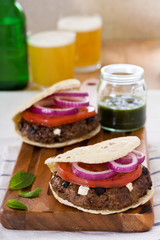 Lamb burgers with onion and tomato