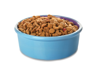 Bowl with dry food for animals on white background