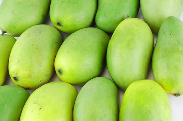 close up on fresh green mango background