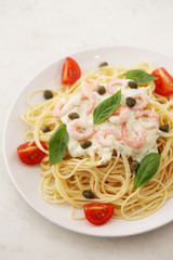 spaghetti with shrimps and tomato