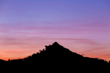 view of mountain siluate on twilight sky after sunset