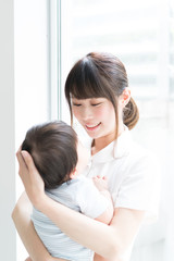 Fototapeta premium 赤ちゃんと女性看護師