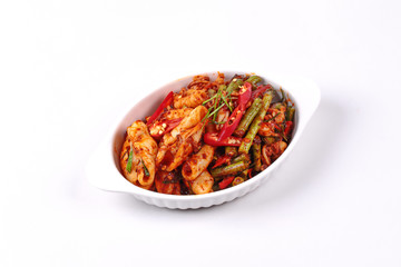 Spicy fried cowpea and squid with roasted chile paste.