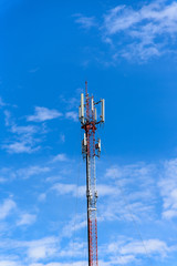 Cellphone telecomunication tower with blue sky