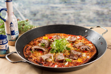 Pizza with Roasted Duck in the pan