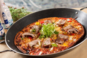 Pizza with Roasted Duck in the pan
