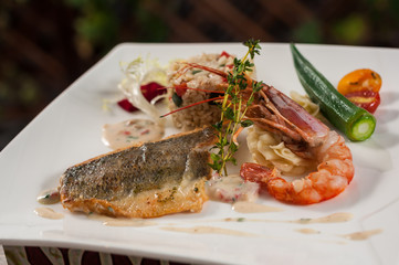 Pan fry sea bass filet and red king prawn with rice