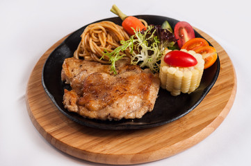 grilled chicken fillet with vegetables and noodles