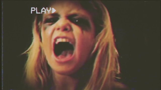 Fake VHS tape: a little girl acting as a scary zombie.
