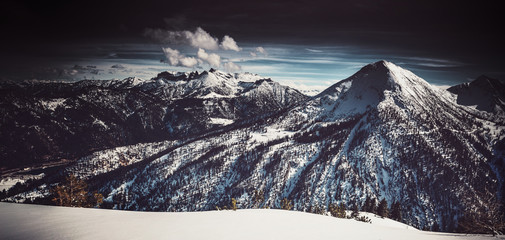 Dark moody artistic alpine panorama
