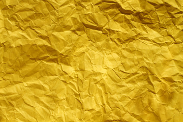 wrinkled yellow paper texture , copy space