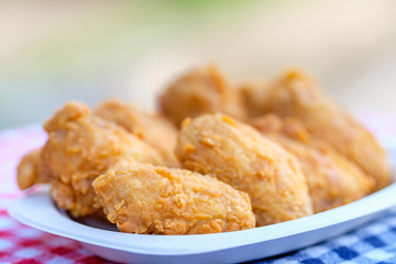A plate of fresh, hot, crispy fried chicken