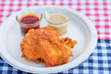 A plate of fresh, hot, crispy fried chicken