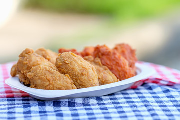 A plate of fresh, hot, crispy fried chicken