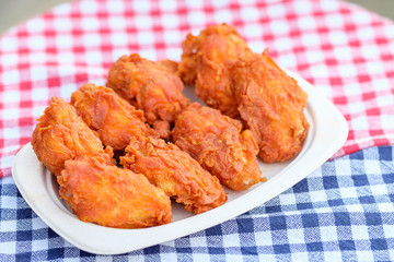 A plate of fresh, hot, crispy fried chicken