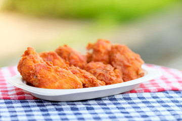 A plate of fresh, hot, crispy fried chicken