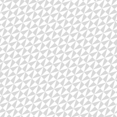 Geometric pattern with gray and white triangles. Seamless abstract background