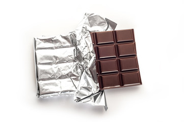 Chocolate bar in wrapper isolated on white background