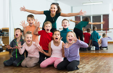 Friendly children  in dance studio having fun