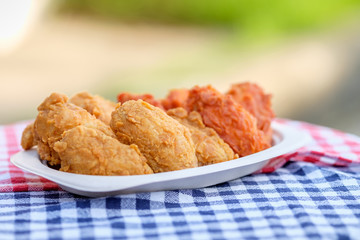 A plate of fresh, hot, crispy fried chicken