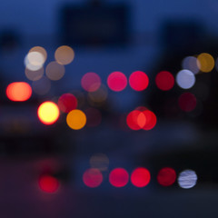 abstract traffic lights out of focus against blue background