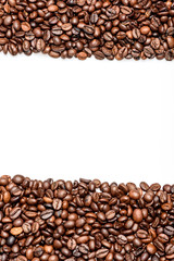Roasted brown coffee beans isolated on white, copyspace
