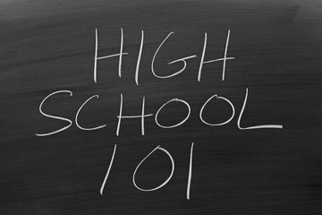 The words "High School 101" on a blackboard in chalk