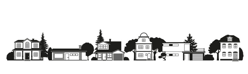 Silhouettes of houses in suburban street