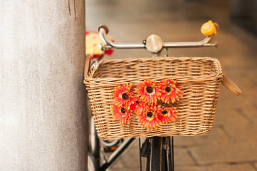 Wicker basket with flowers.