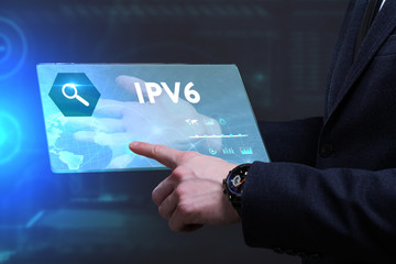 Business, Technology, Internet and network concept. Young businessman working on a virtual screen of the future and sees the inscription: IPv6