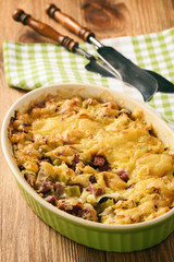Casserole with bread, leek, ham and cheese.