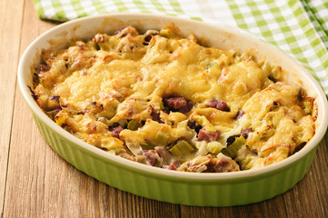 Casserole with bread, leek, ham and cheese.