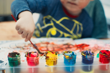 Child draws paints