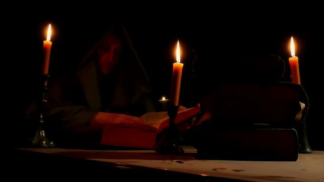 Old Church Books in the Hands of Monk
