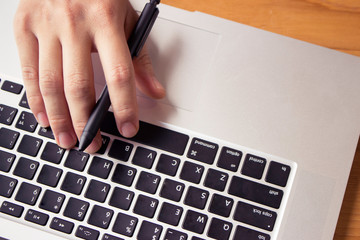 man working at home office hand on keyboard close up © ptyphoto