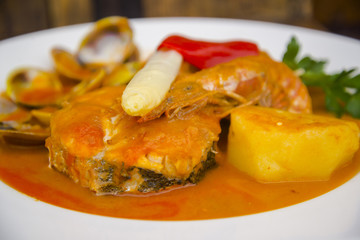 Stewed and garnished fish dish