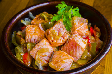 Delicious smoked salmon bits dish with vegetables