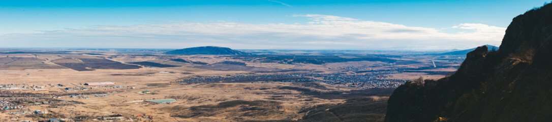Scenic rural landscape with mountains.