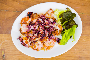 Roasted chicken wings and thighs dish