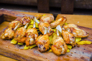 Roasted chicken wings and thighs dish