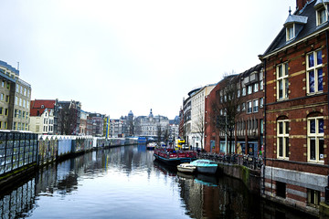 Fototapeta na wymiar Amsterdam canals and typical houses
