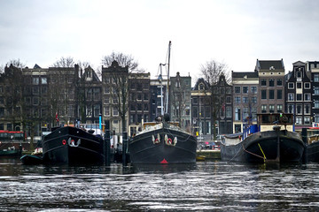 Obraz premium Amsterdam canals and typical houses