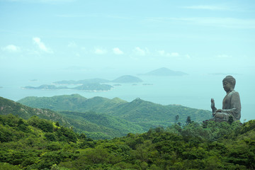 HONG KONG, CHINA - MARCH  7, 2014: The enormous Tian Tan Buddha at Po Lin Monastery at Lantau island