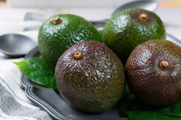 Green ripe avocado from organic avocado plantation - healthy food
