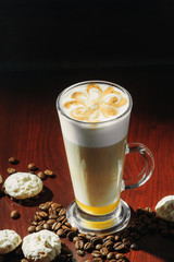 Cup of coffee latte on a black background