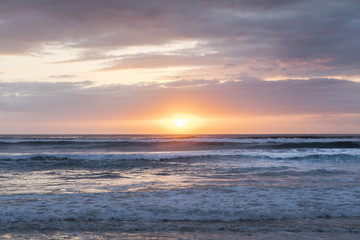 Cloudy and colourful beach sunrse on the Gold Coast