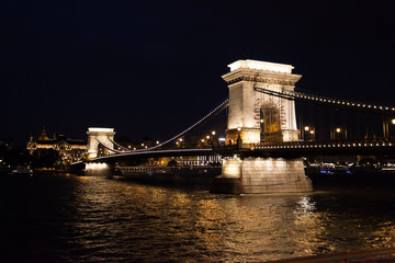 Szechenyi Chain Bridge in beautiful Budapest in the evening. Bridge over the Danube River, connects the two banks of the Buda and Pest, in the capital of Hungary.